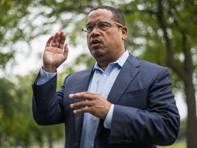 FILE - In this Aug. 17, 2017, file photo, U.S. Rep. Keith Ellison addresses campaign volunteers and supporters in Minneapolis. A lawyer investigating a claim by Ellison's ex-girlfriend, Karen Monahan that she was physically abused by Ellison in 2016 has concluded the allegation is unsubstantiated. The Associated Press on Monday, Oct. 1, 2018, obtained a draft of the report by Susan Ellingstad, an attorney hired by Minnesota's Democratic-Farmer-Labor Party to investigate the allegation.