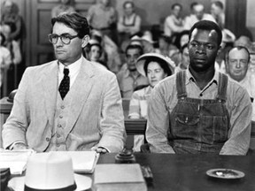 Gregory Peck as Atticus Finch, and Brock Peters as his client Tom Robinson, in the 1962 film To Kill a Mockingbird. An Ontario teacher says his board has banned the 1960 book by Harper Lee.