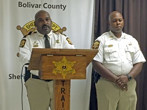 Bolivar County Sheriff Kelvin Williams, left, speaks to reporters at a news conference, Tuesday, Oct. 16, 2018, in Shaw, Miss., concerning a 20-month-old girl discovered dead in an oven. Accompanying the sheriff is Chief Deputy Gerald Wesley Jr.