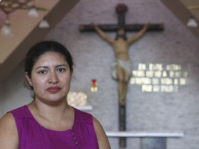 Cecilia Flores poses for a portrait inside the chapel where Archbishop Oscar Arnulfo Romero was assassinated in 1980, in San Salvador, El Salvador, Friday, Oct. 5, 2018. Flores underwent an emergency cesarean section and was diagnosed with an infection that left her in a coma. Suffering from internal hemorrhaging and with her kidneys on the verge of collapse, she was not expected to survive, but after her husband prayed to Romero for intervention, Flores made a full recovery.