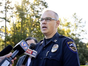 Matthews Police Captain Stason Tyrrell briefs the media after a deadly shooting at Butler High School in Matthews, N.C., Monday, Oct. 29, 2018. A student shot and killed a fellow student during a fight in a crowded school hallway Monday, officials said, prompting a lockdown and generating an atmosphere of chaos and fear as dozens of parents rushed to the school to make sure their children were safe.