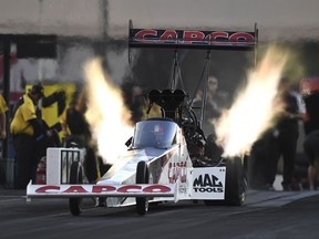 In this photo provided by the NHRA, Top Fuel racer Steve Torrence remains the dominant car in the category on Friday, Oct. 12, 2018, and races to the provisional qualifying lead in his category at the NHRA Carolina Nationals in Charlotte, N.C.