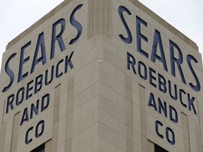 A sign for a Sears department store is displayed in Hackensack, N.J., Monday, Oct. 15, 2018. Sears filed for Chapter 11 bankruptcy protection Monday, buckling under its massive debt load and staggering losses.