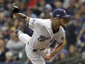 Milwaukee Brewers relief pitcher Josh Hader (71) throws during the third inning of Game 7 of the National League Championship Series baseball game against the Los Angeles Dodgers Saturday, Oct. 20, 2018, in Milwaukee.