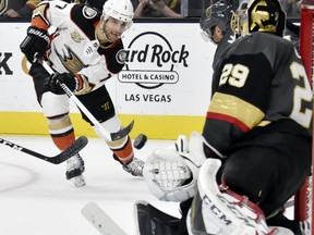 Anaheim Ducks center Andrew Cogliano (7) shoots against Vegas Golden Knights goaltender Marc-Andre Fleury (29) during the first period of an NHL hockey game Saturday, Oct. 20, 2018, in Las Vegas.