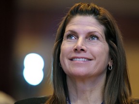 FILE - In this Feb. 12, 2011, file photo, then-Rep. Mary Bono, R-Calif., listens at the Conservative Political Action Conference (CPAC) in Washington.  USA Gymnastics has hired Bono as interim president and chief executive officer. The organization announced the move Friday, Oct. 12, 2018. Bono will hold the position while USA Gymnastics searches for a permanent successor to Kerry Perry, who resigned under pressure from the United States Olympic Committee in September after spending nine months on the job.