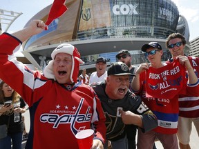 FILE - In this May 30, 2018, file photo, Washington Capitals and Vegas Golden Knights fans cheer outside T-Mobile Arena prior to Game 2 of the NHL hockey Stanley Cup Finals, in Las Vegas. Hockey fans have often criticized NBC's coverage for not showing more of the NHL's young stars and the up-and-coming teams. That changes when the season opens on Wednesday, Oct. 3, as the network goes with a new approach.