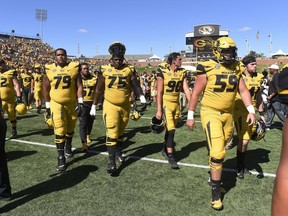 FILE - In this Sept. 22, 2018, file photo, the Missouri football team walks off the field after losing 43-29 to Georgia in an NCAA college football game, in Columbia, Mo. The bye week came at a good time for Missouri, which hung with Georgia before mistakes wound up biting them.