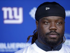 FILE - In this June 12, 2018, file photo, New York Giants defensive tackle Damon Harrison talks to reporters in East Rutherford, N.J. A person with knowledge of the deal tells The Associated Press the New York Giants are trading star defensive tackle Damon "Snacks" Harrison to the Detroit Lions. The person says the Giants will receive a fifth-round pick in 2019 for the stalwart in the middle of the defensive line. The person spoke to the AP on condition of anonymity Wednesday, Oct. 24, 2018, because the deal has not been announced.