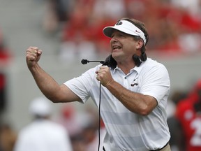 FILE - In this Sept. 15, 2018, file photo, Georgia head coach Kirby Smart directs his team during an NCAA college football game against Middle Tennessee in Athens, Ga. The Georgia Bulldogs must run a gauntlet of four straight games against Southeastern Conference opponents currently ranked in the Top 25. LSU, Florida, Kentucky and Auburn