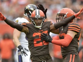 FILE - In this Oct. 7, 2018, file photo, Cleveland Browns defensive back E.J. Gaines (28) celebrates after breaking up a pass during the first half of an NFL football game against the Baltimore Ravens, in Cleveland. Gaines has a concussion and will miss Sunday's game at Tampa Bay. Gaines practiced Wednesday but he showed concussion symptoms on Thursday, Oct. 18,  and was placed in league protocol.