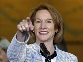 FILE - In this Dec. 6, 2017, file photo, Seattle Mayor Jenny Durkan acknowledges a reporter while taking questions before signing an agreement to renovate KeyArena in Seattle. Seattle is almost on the goal line in its pursuit of an NHL team thanks to an ownership group featuring Jerry Bruckheimer, a successful deal to renovate downtown KeyArena and fervent interest from fans that led to 10,000 season tickets selling out in 12 minutes and 32,000 total deposits being secured.