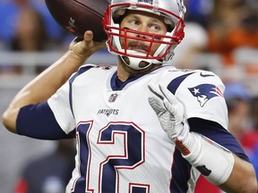 FILE - In this Sept. 23, 2018, file photo, New England Patriots quarterback Tom Brady throws during the first half of an NFL football game against the Detroit Lions, in Detroit. Brady, who will retire as possibly the best to ever play the position, faces Kansas City's Patrick Mahomes, the most electrifying quarterback in the NFL this season, on Sunday.