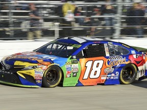 FILE - In this Sunday, Oct. 1, 2017 file photo, Kyle Busch competes during the NASCAR Cup Series auto race at Dover International Speedway in Dover, Del. Dover is ready to roll the dice on NASCAR betting. Sports betting has come to Delaware and the track is set to throw open the betting windows and allow wagers on most of this weekend's track activity. The NASCAR Cup race on Sunday, Oct. 7, 2018 is the main attraction. Fans can bet on the race winner, the first two stage winners, and a slew of prop bets that range from number of drivers to lead a lap to the average race speed.