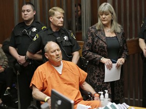 FILE - In this Friday, April 27, 2018 file photo, Joseph James DeAngelo, 72, who authorities suspect is the "Golden State Killer" responsible for at least a dozen murders and 50 rapes in the 1970s and 80s, is accompanied by Sacramento County Public Defender Diane Howard, right, during his arraignment in Sacramento County Superior Court in Sacramento, Calif. Authorities said they used a genetic genealogy website to connect some crime-scene DNA to DeAngelo.