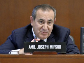 This Nov. 12, 2014 photo made available by the Organization of American States shows Maltese academic Joseph Mifsud during a meeting in Washington. It was Mifsud who allegedly dropped the first hint that the Russians were interfering into the 2016 U.S. presidential election and he has not been seen publicly for nearly a year. An Associated Press investigation published Monday, Oct. 22, 2018, shows it isn't the first time Mifsud has gone to ground.