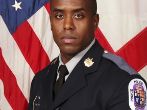 This undated image provided by the Prince George's County Police Department shows slain officer Jacai Colson. A trial is expected to start Wednesday, Oct. 24, 2018, for Michael Ford, a man charged with attacking a Maryland police station while his two brothers videotaped the shootout, which led to an officer mistakenly killing Colson, an undercover detective. (Prince George's County Police Department via AP)