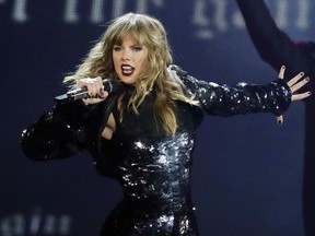 FILE - In this May 8, 2018, file photo, Taylor Swift performs during her "Reputation Stadium Tour" opener in Glendale, Ariz. Swift will open the "2018 American Music Awards." The singer made the announcement Tuesday, Oct. 2, on ABC's "Good Morning America."