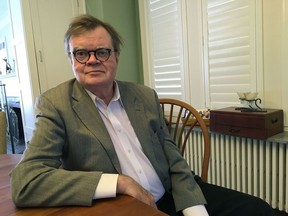 FILE - In this, Feb. 23, 2018, file photo, Garrison Keillor poses for a photo in Minneapolis. An appearance by Keillor, former host of "A Prairie Home Companion," at a Vermont book festival has been canceled after public outcry. Burlington Book Festival Founding Director Rick Kisonak confirmed to Vermont Public Radio that the Oct. 14 fundraising event would not take place.