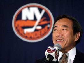 FILE - In this June 8, 2006, file photo, New York Islanders owner Charles Wang addresses members of the media during a news conference, in Uniondale, N.Y. Wang, a technology company founder who formerly owned the New York Islanders hockey team has died. He was 74. His attorney John McEntee says in an emailed statement that Wang died Sunday, Oct. 21, 2018, in Oyster Bay, N.Y.