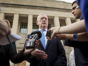 FILE - In this Oct. 9, 2018, file photo, Defense Secretary Jim Mattis speaks to reporters at the Pentagon, in Washington. President Donald Trump says he has a "very good relationship" with  Mattis even though he thinks the Pentagon chief is "sort of a Democrat." Asked during a "60 Minutes" interview airing Sunday, Oct. 14, whether Mattis will step down, Trump says Mattis hasn't told him that.