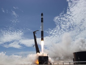 FILE - In this Jan 21, 2018, file photo provided by Rocket Lab, electron rocket carrying only a small payload of about 150 kilograms (331 pounds), lifts off from the Mahia Peninsula on New Zealand's North Island's east coast. A California-based startup says it will rocket small satellites into orbit from Virginia. (Rocket Lab via AP, File)