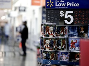 FILE- In this Nov. 9, 2017, file photo items are seen on display ahead of the holiday shopping season at a Walmart store in North Bergen, N.J. Walmart Inc. is making two improvements to its third-party marketplace heading into the holidays as it seeks to better compete with online leader Amazon.com.