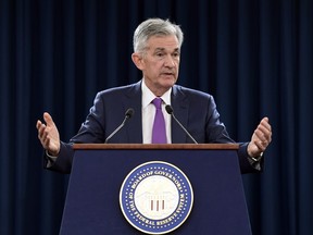 FILE- In this Sept. 26, 2018, file photo Federal Reserve Chairman Jerome Powell speaks during a news conference in Washington. On Wednesday, Oct. 17, the Federal Reserve releases minutes from its September meeting when it lifted rates for the third time this year.