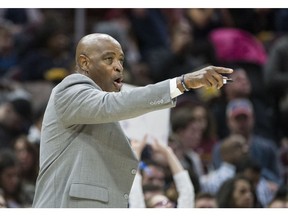 FILE - In this April 1, 2018 file photo, Cleveland Cavaliers interim coach Larry Drew gestures to his team during the second half of an NBA basketball game against the Dallas Mavericks in Cleveland. The Cavaliers have a coach for Tuesday night, Oct. 30. Top assistant Drew, who was expected to take over after Cleveland fired Tyronn Lue, said Monday, Oct. 29 that he is not the team's interim coach but is merely "the voice right now." Drew said his agent Andy Miller has been in talks with the Cavs about restructuring his contact and is not making any long-term commitment to the team until they reach an agreement. Lue was fired on Sunday, Oct. 28 by general manager Koby