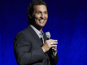 FILE - In this April 23, 2018 file photo, Matthew McConaughey, a cast member in the upcoming film "White Boy Rick," speaks during the Sony Pictures Entertainment presentation at CinemaCon 2018 in Las Vegas. Firefighters, police officers and 911 operators in Houston got a surprise from a famous local as McConaughey delivered a catered lunch as way to give thanks on National First Responders Day.