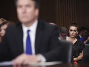 FILE - In this Sept. 27, 2018 file photo, actress and activist Alyssa Milano listens as Supreme Court nominee Brett Kavanaugh testifies before the Senate Judiciary Committee on Capitol Hill in Washington. Now that the #MeToo movement has passed the one-year mark, key voices in the movement are assessing progress and looking forward to the next phase. For actress Milano, it's about winning the cultural battle, despite a perceived setback with the confirmation of  Brett Kavanaugh confirmation to the Supreme Court.