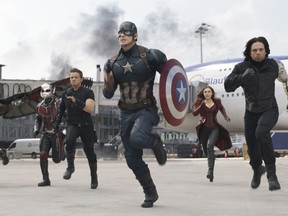 In an image released by Disney, from left, Paul Rudd, Jeremy Renner, Chris Evans, Elizabeth Olsen and Sebastian Stan appear in a scene from "Captain America: Civil War."