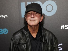 FILE - In this Oct. 14, 2014 file photo, Tony Joe White attends the premiere of HBO's "Foo Fighters Sonic Highway" in New York. White, who had a hit in 1969 with "Polk Salad Annie" and whose songs were covered by music greats like Elvis Presley, Hank Williams Jr., Tina Turner, Ray Charles and Waylon Jennings, died Wednesday, Oct. 24, 2018. He was 75.
