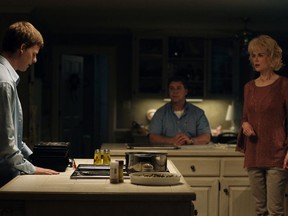 This image released by Focus Features shows Lucas Hedges, from left, Russell Crowe and Nicole Kidman in a scene from "Boy Erased." (Focus Features via AP)
