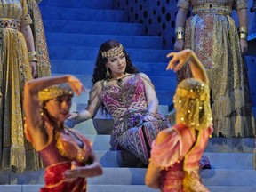 This Sept. 11, 2018 photo released by The Metropolitan Opera shows mezzo-soprano Elina Garanca as Dalila in a scene from  Saint-Saens' "Samson et Dalila" at the Metropolitan Opera in New York. A new production will be broadcast live in HD to movie theaters on Saturday, Oct. 20.