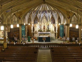 Urns with cremated ashes of eight of the 20 people killed in last Saturday's fatal limousine crash in Schoharie, N.Y., are set in place as friends and family prepare for a funeral mass at St. Stanislaus Roman Catholic Church in Amsterdam, N.Y., Saturday, Oct. 13, 2018.