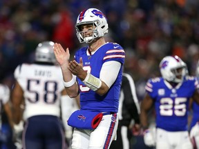 Buffalo Bills quarterback Derek Anderson reacts after a play against the New England Patriots during the first half of an NFL football game, Monday, Oct. 29, 2018, in Orchard Park, N.Y.