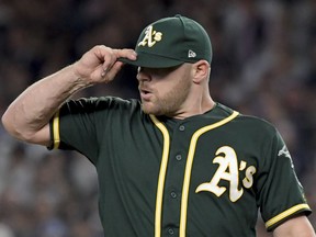 Oakland Athletics pitcher Liam Hendriks reacts after giving up a two-run home run to New York Yankees' Aaron Judge during the first inning of the American League wildcard playoff baseball game, Wednesday, Oct. 3, 2018, in new York