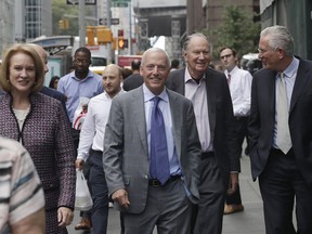 Seattle Mayor Jenny Durkan, left, walks with Seattle Hockey Partners David Wright, center, David Bonderman, second from right, and Tim Leiweke as they leave a meeting at National Hockey League headquarters, Tuesday, Oct. 2, 2018, in New York. Members of Seattle's potential ownership group and Mayor Durkan presented their case to the Board of Governors' executive committee at the league office. If the executive committee moves the process forward, the board could vote as soon as December to award the NHL's 32nd franchise to Seattle.