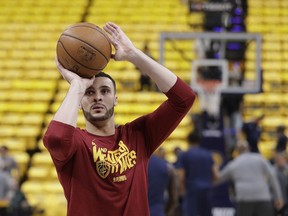 FILE - In this April 27, 2018 file photo Cleveland Cavaliers' Larry Nance Jr. shoots before Game 6 of the team's first-round NBA basketball playoff series against the Cleveland Cavaliers in Indianapolis. The Cavaliers and Nance have agreed on a four-year, $44.8 million contract extension. The sides reached terms on Monday, Oct. 15, 2018 which was a deadline to work out a deal. Nance joined the Cavs last season, coming over in a trade from the Lakers. Cleveland views the 25-year-old as one of its core players as it rebuilds without LeBron James.
