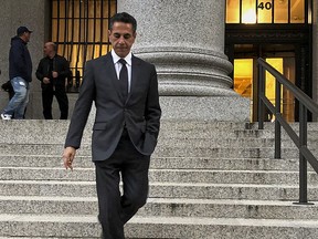 Philadelphia mob boss Joseph "Skinny Joey" Merlino leaves Manhattan federal court after he was sentenced Wednesday, Oct. 17, 2018, to two years in prison on an illegal gambling charge. Merlino chuckled as he remarked that President Donald Trump was right to suggest that criminals who become government cooperators or so-called "flippers" perhaps should be outlawed.