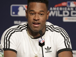 New York Yankees starting pitcher Luis Severino listens to a question during a news conference Tuesday, Oct. 2, 2018, in New York. Severino is scheduled to start against the Oakland Athletics in an American League wildcard baseball game on Wednesday.