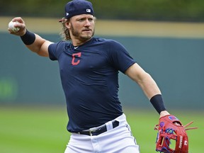 Cleveland Indians' Josh Donaldson throws during a baseball team workout, Tuesday, Oct. 2, 2018, in Cleveland. The Indians will play the Houston Astros Friday in Game 1 of the AL Division Series.