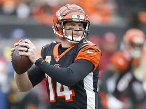 Cincinnati Bengals quarterback Andy Dalton prepares to throw in the first half of an NFL football game against the Pittsburgh Steelers, Sunday, Oct. 14, 2018, in Cincinnati.