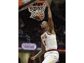 Cleveland Cavaliers' Rodney Hood dunks the ball against the Atlanta Hawks in the first half of an NBA basketball game, Tuesday, Oct. 30, 2018, in Cleveland.