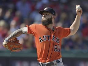 Houston Astros starting pitcher Dallas Keuchel delivers in the second inning during Game 3 of the baseball American League Division Series against the Cleveland Indians, Monday, Oct. 8, 2018, in Cleveland.