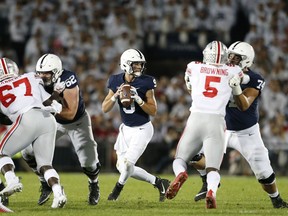 Penn State quarterback Trace McSorley (9) drops back to pass against Ohio State during the first half of an NCAA college football game in State College, Pa., Saturday, Sept. 29, 2018.