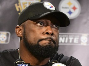 Pittsburgh Steelers head coach Mike Tomlin listens to a question while meeting with reporters following a 26-14 loss to the Baltimore Ravens in an NFL football game in Pittsburgh, Sunday, Sept. 30, 2018.