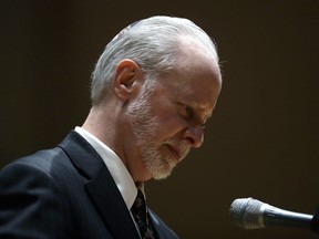 Rabbi Jeffrey Myers of Tree of Life stands at the podium in Soldiers & Sailors Memorial Hall & Museum during a community gathering held in the aftermath of Saturday's deadly shooting at the Tree of Life Synagogue in Pittsburgh, Sunday, Oct. 28, 2018.