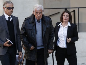 French actor Jean-Paul Belmondo, center, arrives to a ceremony to pay tribute to late singer Charles Aznavour, Friday, Oct.5, 2018 in Paris. Aznavour, the French crooner and actor whose performing career spanned eight decades and who seduced fans around the world with his versatile tenor, lush lyrics and kinetic stage presence, has died. He was 94.